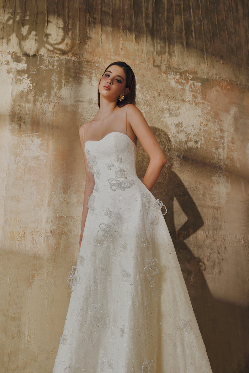 White L'SCARLETT A-line spaghetti straps glitter lace maxi dress, elegant evening gown with intricate lace details.
