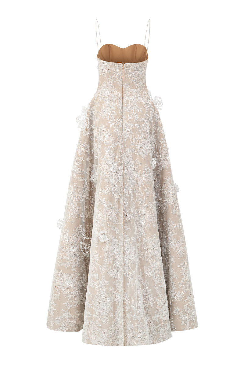 White L'SCARLETT A-line spaghetti strap gown with lace and gitter details, elegant evening dress with a flowing silhouette.