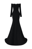 Black long-sleeve poly crepe off-shoulder mermaid gown by L'Scarlett, shown from the front with fitted silhouette and elegant design.