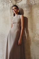 L'SCARLETT sleeveless flared midi dress with a fitted bodice and flowing skirt, perfect for stylish summer occasions.