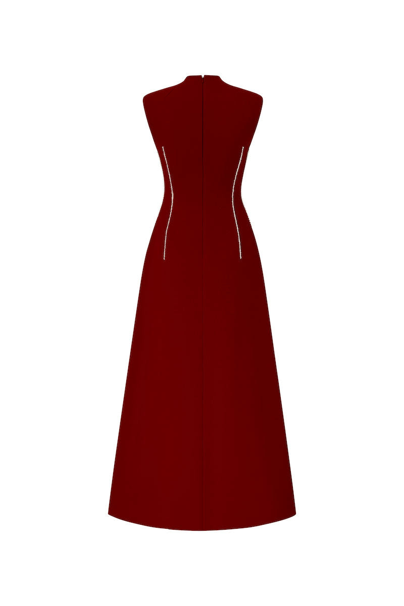 Red sleeveless flared midi dress by L'SCARLETT, showcasing a flowy silhouette and stylish design on a model.