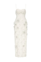 White spaghetti strap fringe jacquard gown by L'SCARLETT featuring intricate woven patterns and a flowing silhouette.