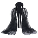Black L'SCARLETT off-shoulder long-sleeve poly crepe jumpsuit with a form-fitting design, shown on a model.