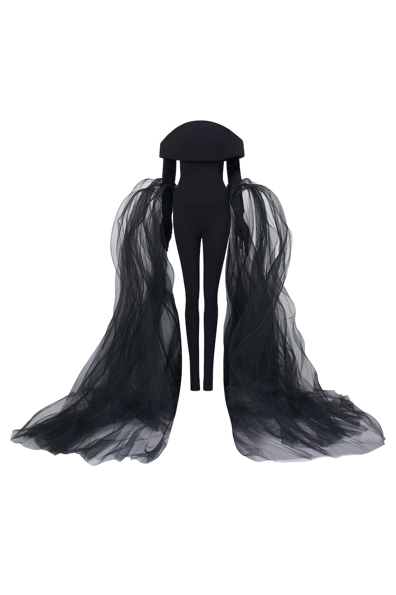 Black L'SCARLETT off-shoulder long-sleeve poly crepe jumpsuit with a form-fitting design, shown on a model.