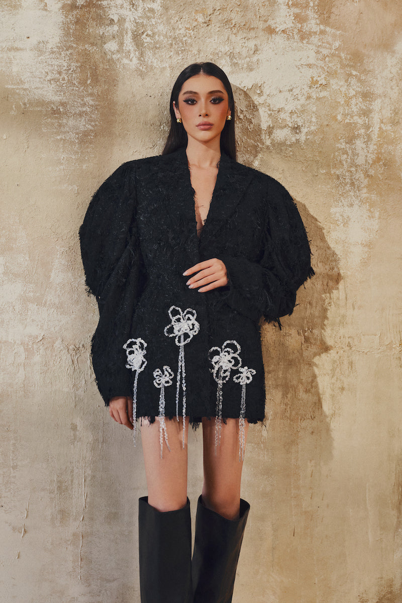 L'SCARLETT long-sleeve mini blazer dress in black, featuring structured lapels and tailored fit, shown on a model.