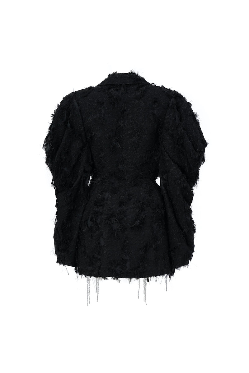Black long-sleeve mini blazer dress by L'SCARLETT, featuring a tailored fit and classic lapel collar, shown on a model.