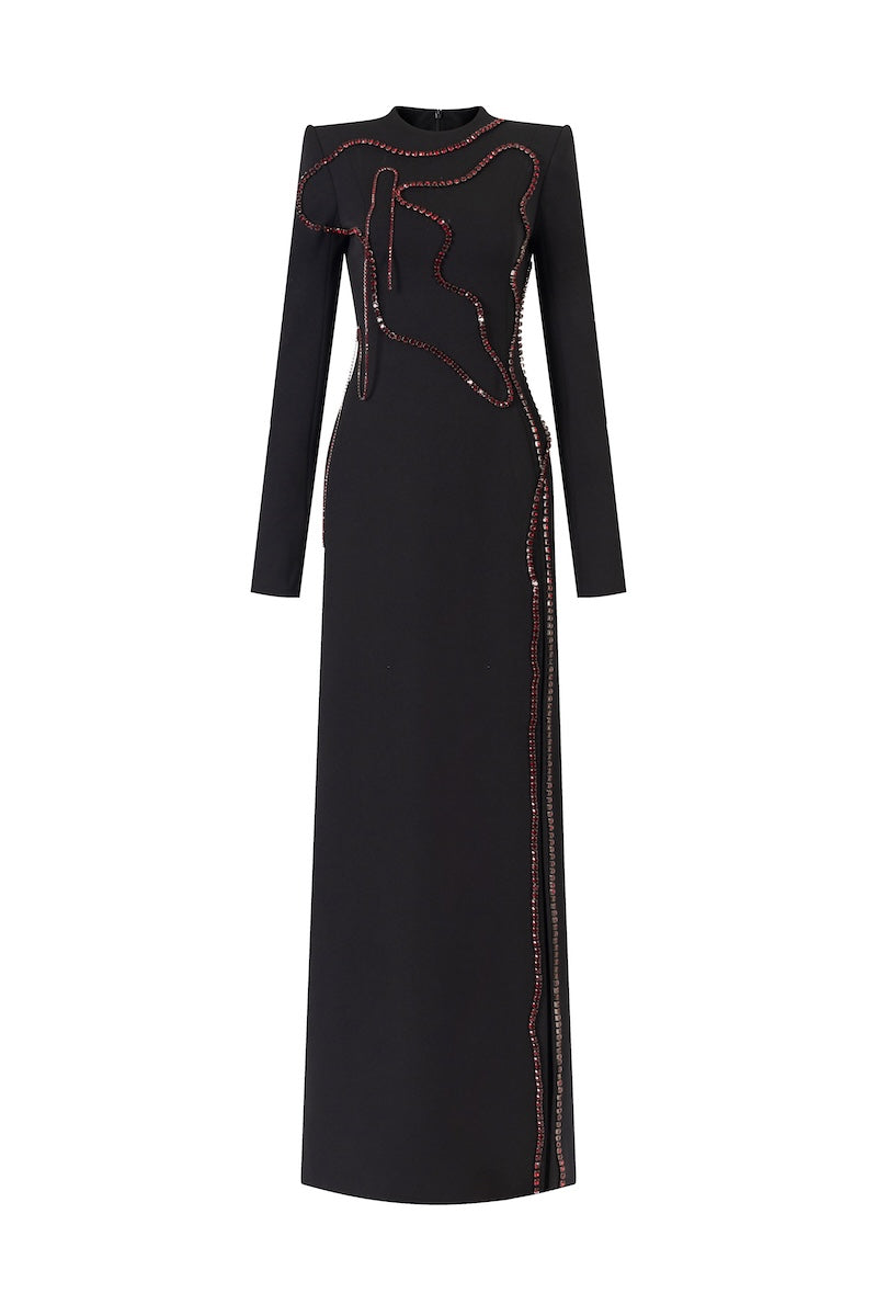Black long-sleeve maxi dress by L'Scarlett featuring beaded details on the front slit and a stylish front slit design.