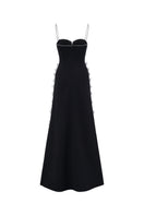 Black L'SCARLETT gown with shoulder straps, elegant evening dress featuring a flowing silhouette and stylish design.