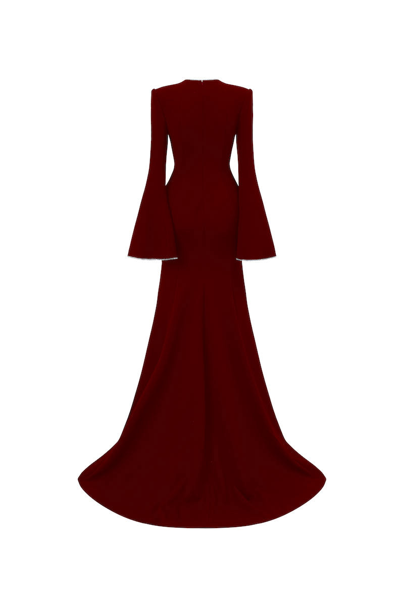 Red long-sleeve mermaid gown by L'SCARLETT featuring fitted bodice and flared skirt, perfect for formal occasions.
