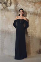 L'SCARLETT off-shoulder long-sleeve gown in elegant fabric, featuring a flowing silhouette and stylish design.