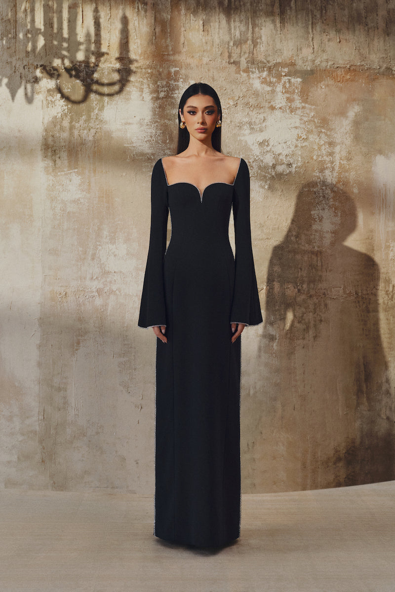 L'SCARLETT long-sleeve gown in soft fabric, featuring a flowing silhouette and elegant design, perfect for formal or casual wear.