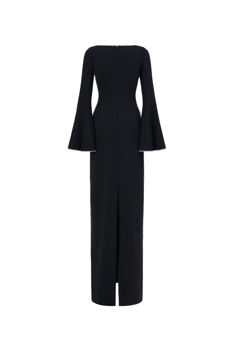 Black long-sleeve gown by L'Scarlett, featuring a flowing design and elegant fit, displayed on a mannequin.