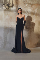 Off-shoulder long-sleeve mermaid gown by L'SCARLETT featuring intricate lace details and a fitted silhouette.