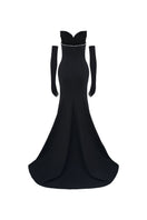 Black off-shoulder long-sleeve mermaid gown by L'SCARLETT displayed on a mannequin, showcasing elegant fitting and fabric details.
