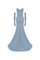 Blue off-shoulder long-sleeve mermaid gown by L'SCARLETT, fitted silhouette with elegant design and flowing fabric.