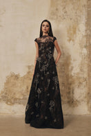 Black L'Scarlett A-line high-neck short-sleeve gown with 3D crystal floral embellishments, elegant evening dress.