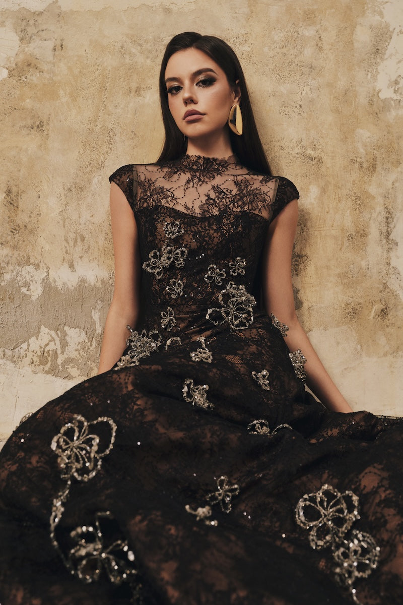 Black L'SCARLETT A-line high-neck short-sleeve maxi dress with 3D crystal floral embellishments, elegant and stylish.