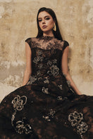 Black A-line high-neck short-sleeve gown with 3D crystal floral embellishments by L'SCARLETT, shown from the front.