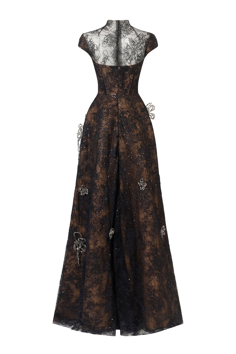Black A-line high-neck short-sleeve maxi dress with 3D crystal floral details by L'SCARLETT, shown from the back.