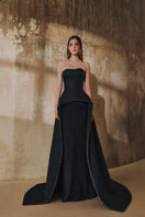 L'SCARLETT strapless floor-sweeping mullet overskirt gown showcasing a flowing design and elegant silhouette.
