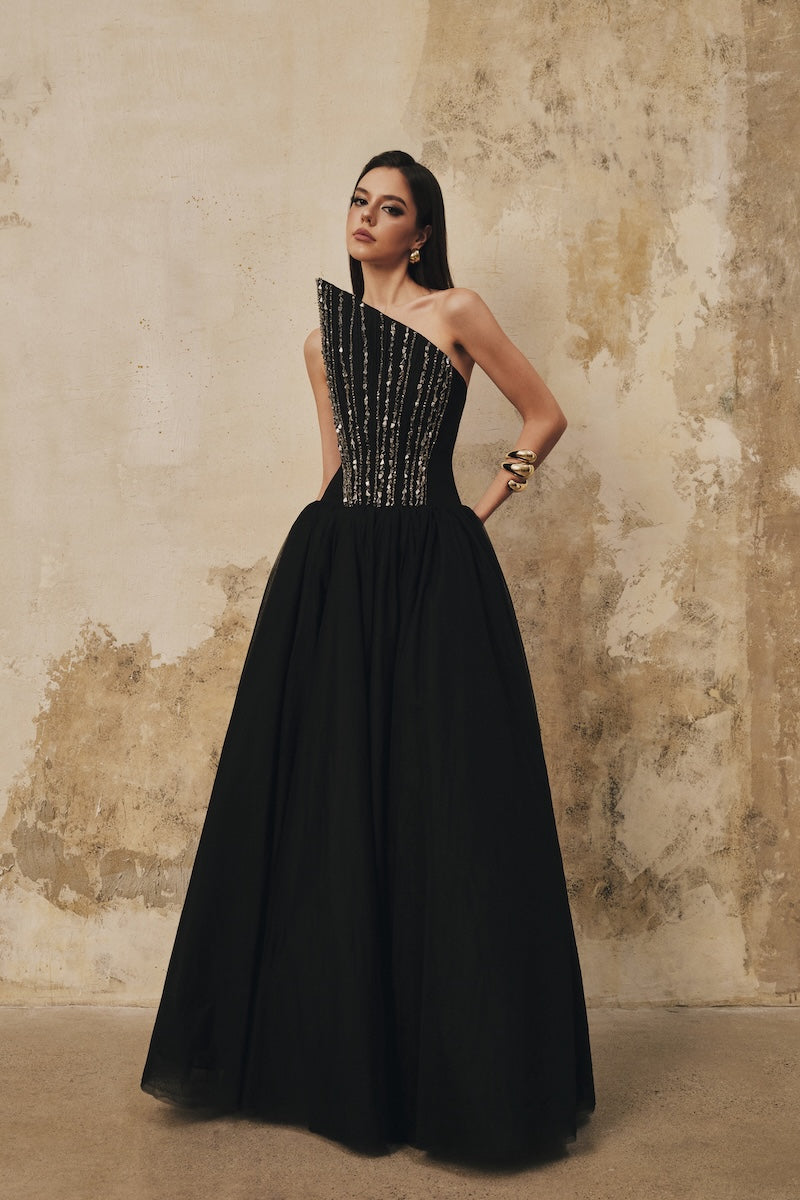 Black L'SCARLETT flared pointed-bustline evening gown with front draped crystal beading, elegant maxi dress for formal occasions.
