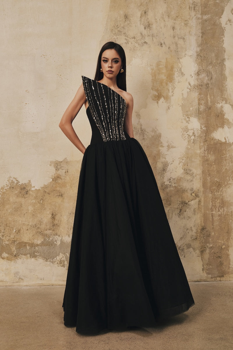 Black L'SCARLETT flared pointed-bustline evening gown with front draped crystal beading, elegant maxi dress for formal occasions.