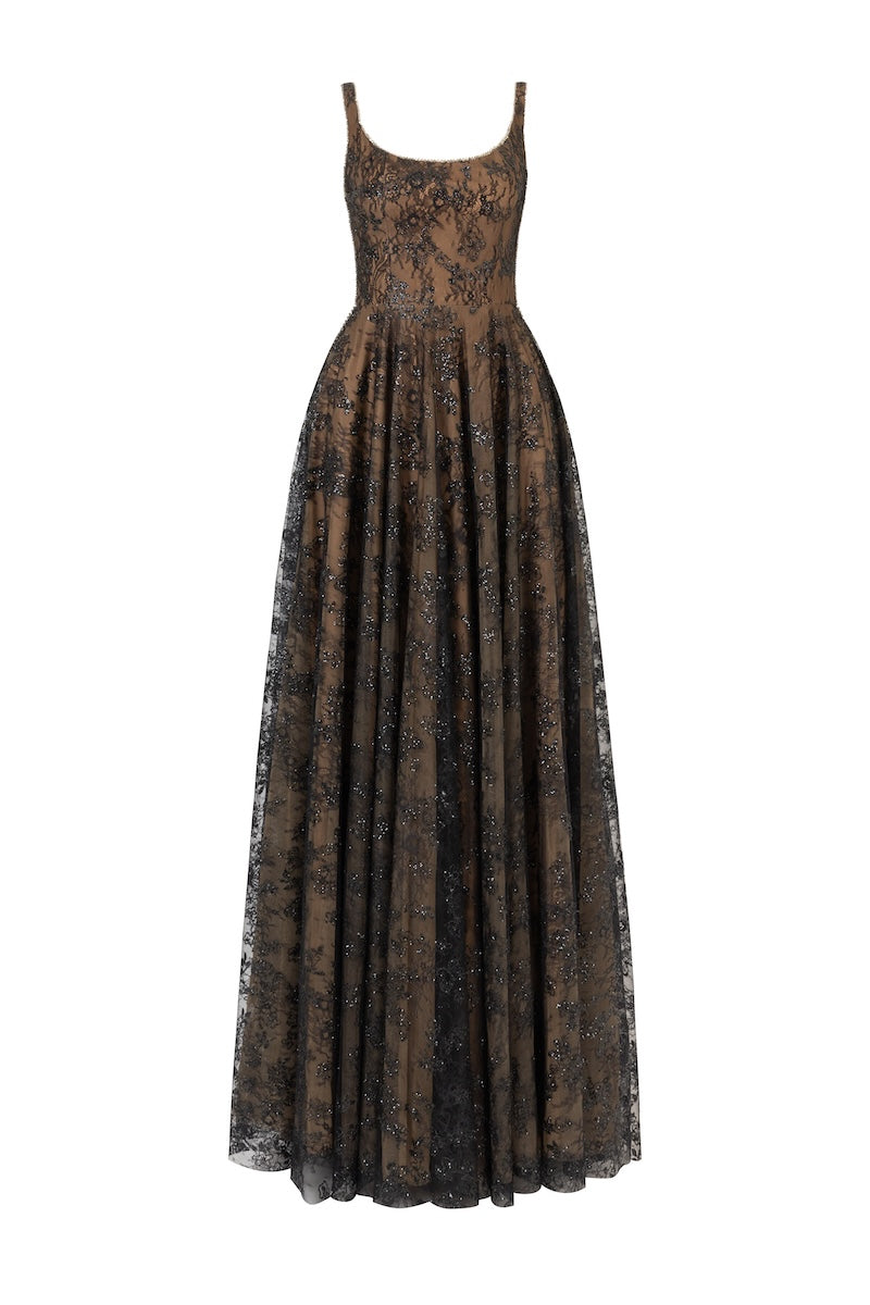 Black L'SCARLETT flared maxi dress with wide shoulder straps and crystal beading, featuring a flowing silhouette and elegant design.