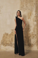 L'SCARLETT pointed-bustline crystal beading front-slit gown featuring elegant detailing and a sleek silhouette.