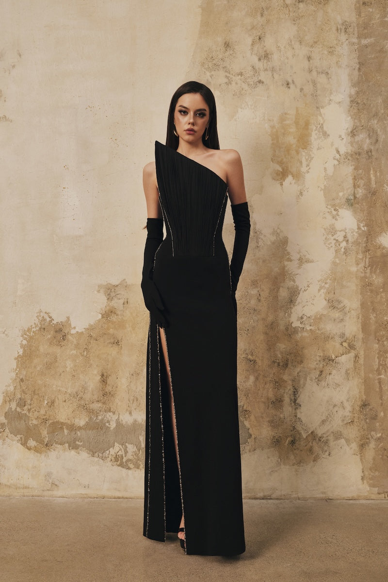 Black pointed-bustline crystal beading front-slit maxi dress by L'SCARLETT, featuring elegant design and flowing fabric.