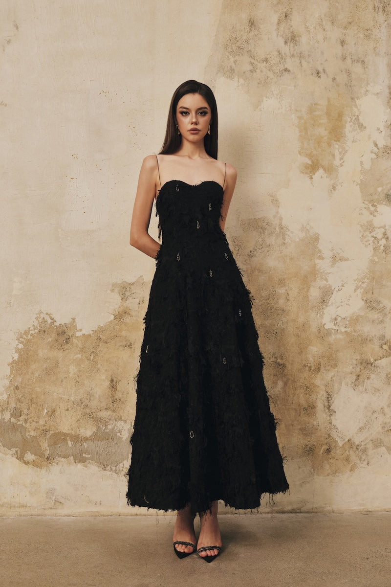 Black L'SCARLETT A-line spaghetti-strap midi dress with crystal beading, elegant and suitable for formal occasions.