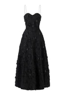Black A-line spaghetti-strap gown with crystal beading by L'SCARLETT, front view showing elegant neckline and detailed embellishments.
