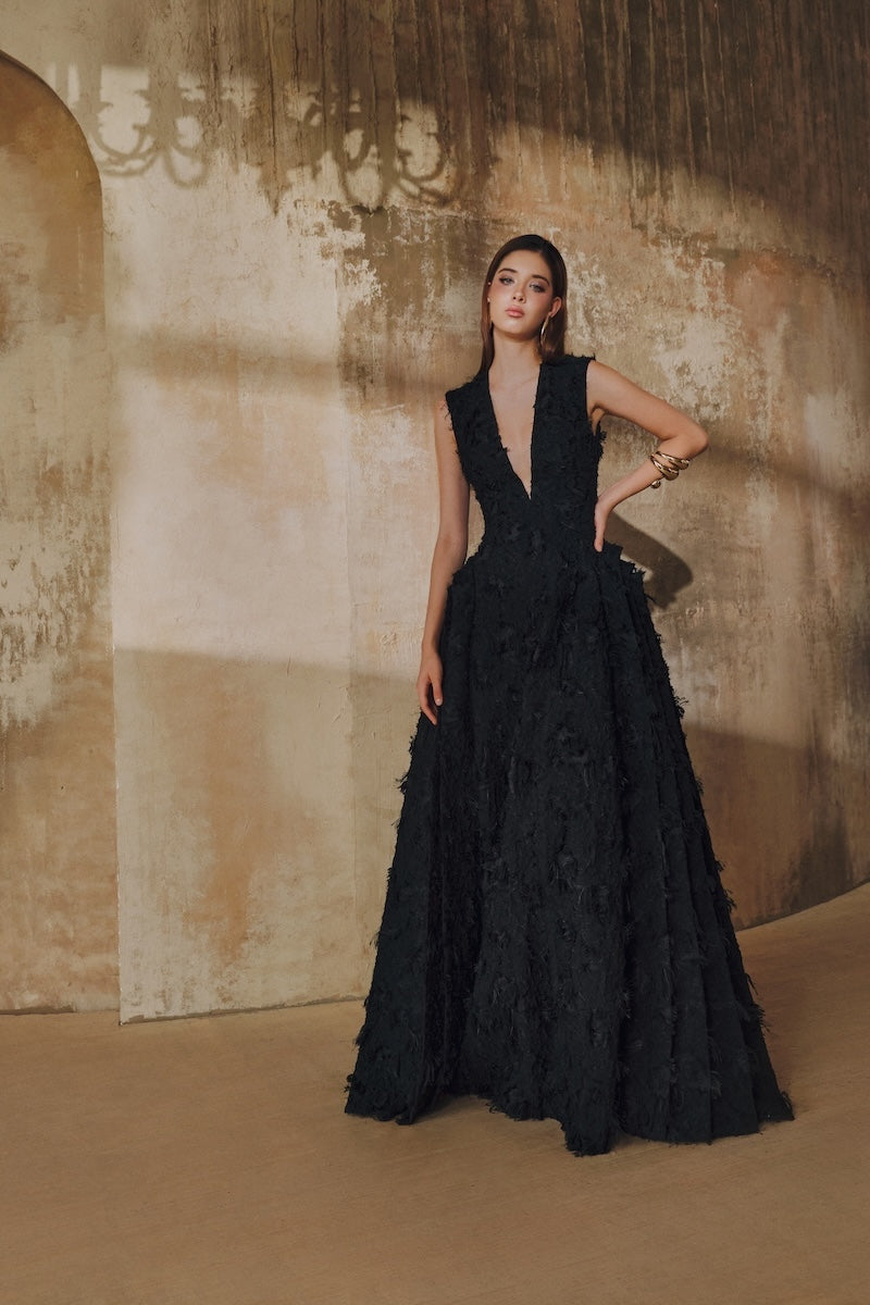Black sleeveless V-neck fringe jacquard layered-side-panel maxi dress by L'SCARLETT, featuring intricate patterns and flowing fabric.