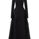 Black flared off-shoulder long-sleeve gown by L'SCARLETT with intricate heart beading on the front.