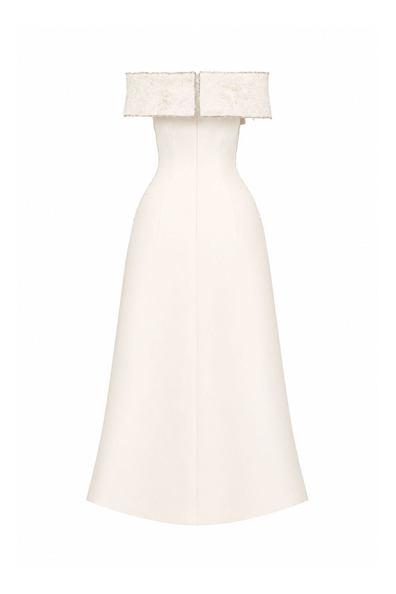 L'SCARLETT flared off-shoulder beaded midi dress in off-white, shown from the back, featuring draped neckline and elegant design.