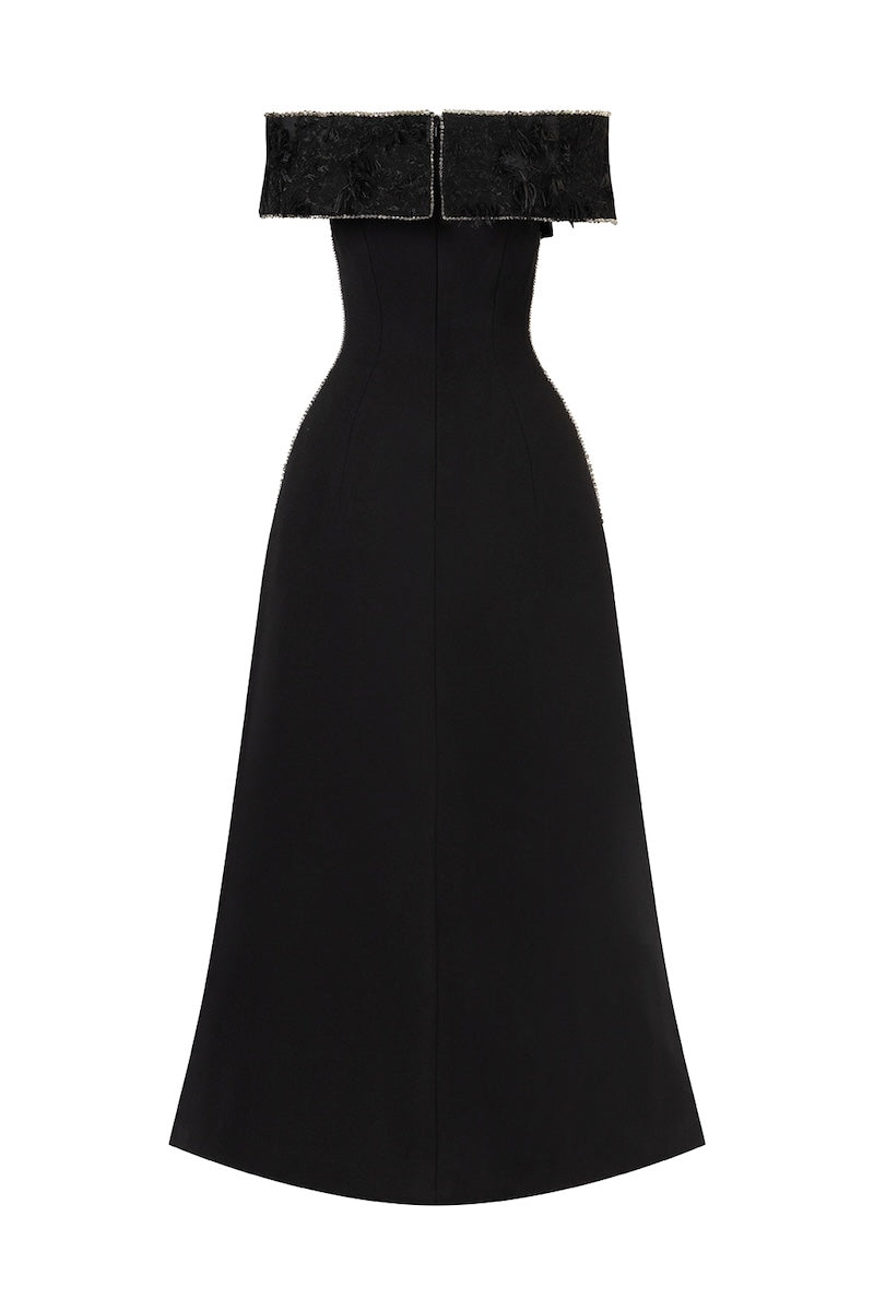 Black beaded midi dress with flared, draped neckline and off-shoulder design by L'SCARLETT, shown from the back.
