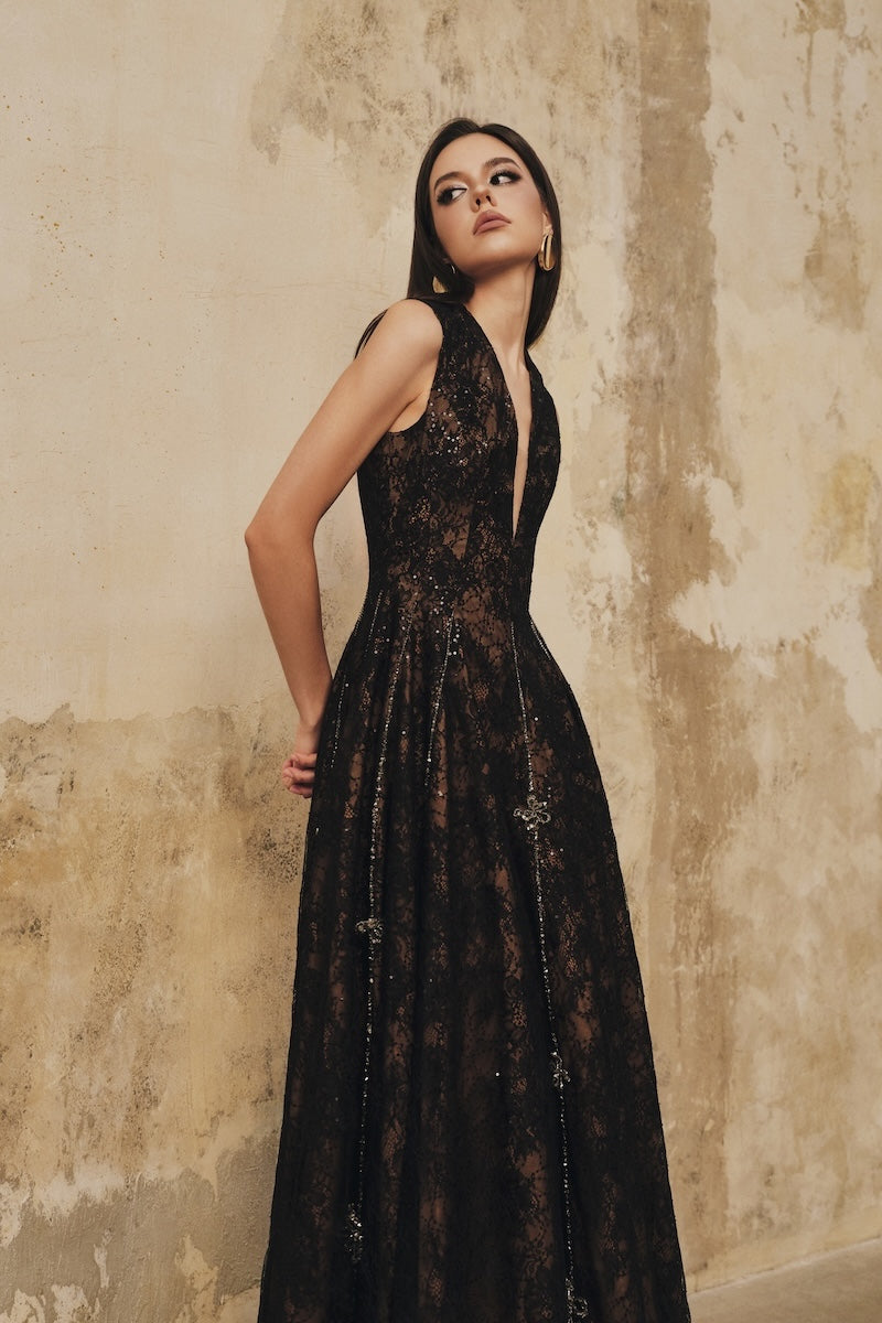 Black sleeveless midi dress by L'SCARLETT featuring a flared V-neckline and 3D crystal floral embellishments.