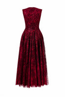 Red sleeveless gown with a flared V-neckline and 3D crystal floral details by L'SCARLETT, shown from the back.