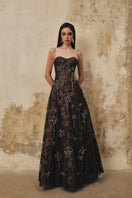 L'SCARLETT A-line spaghetti-strap gown with 3D crystal floral embellishments, elegant evening dress with fitted bodice and flowing skirt.