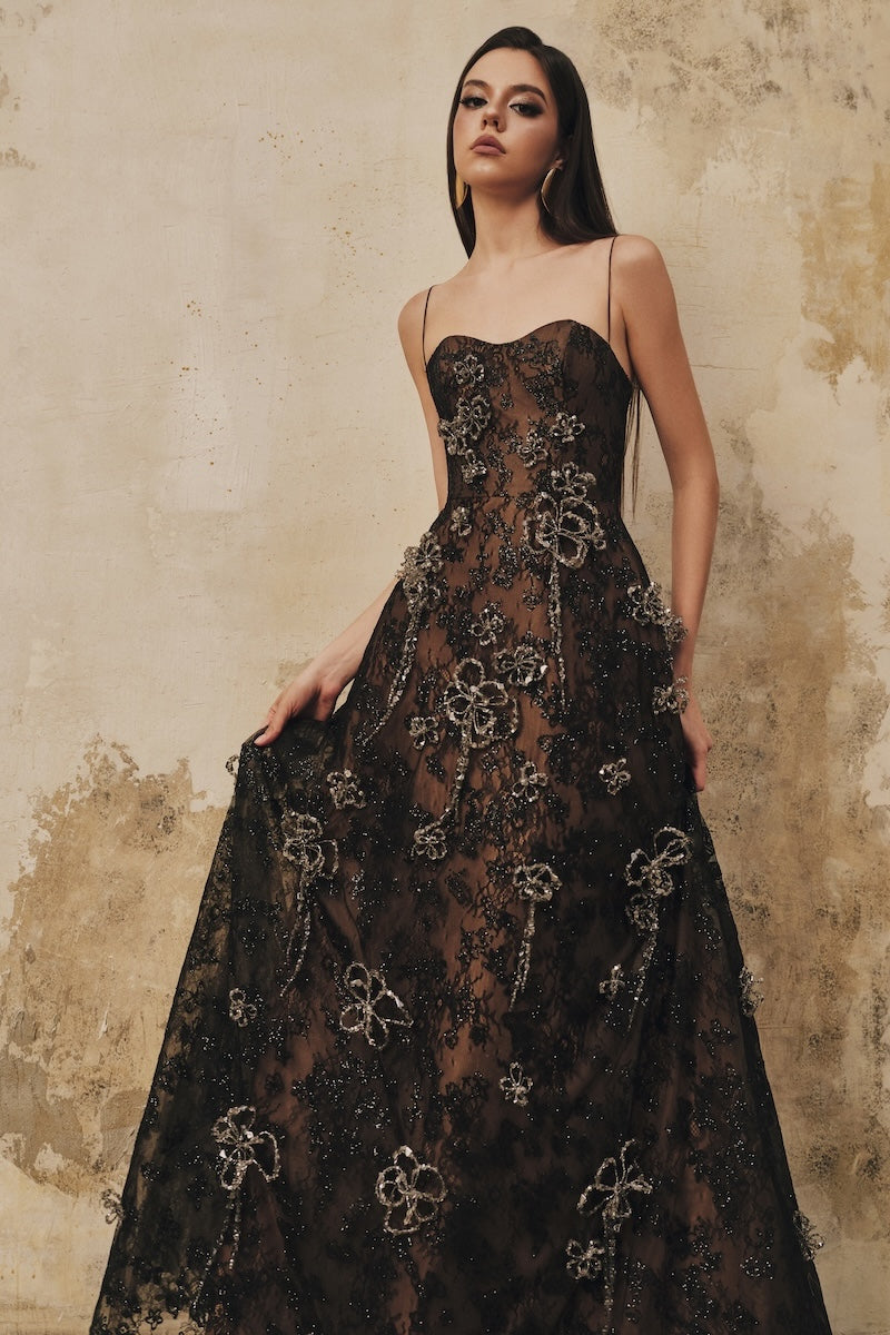 Black A-line spaghetti-strap maxi dress with 3D crystal floral embellishments by L'SCARLETT, perfect for elegant occasions.