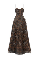 Black L'Scarlett A-line spaghetti-strap gown with 3D crystal floral embellishments, front view showing elegant design and intricate details.