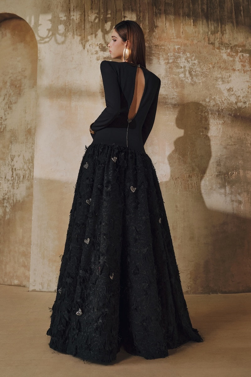 Black L'SCARLETT round-neck open-back maxi dress with hand-embellished crystal heart design, elegant evening style.