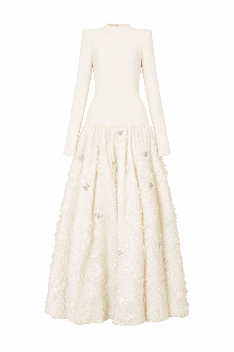 Off-white L'SCARLETT maxi dress with round neck, open-back design and crystal heart embellishment, front view.