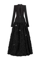 Black round-neck open-back gown by L'SCARLETT featuring a crystal heart embellishment on the back.