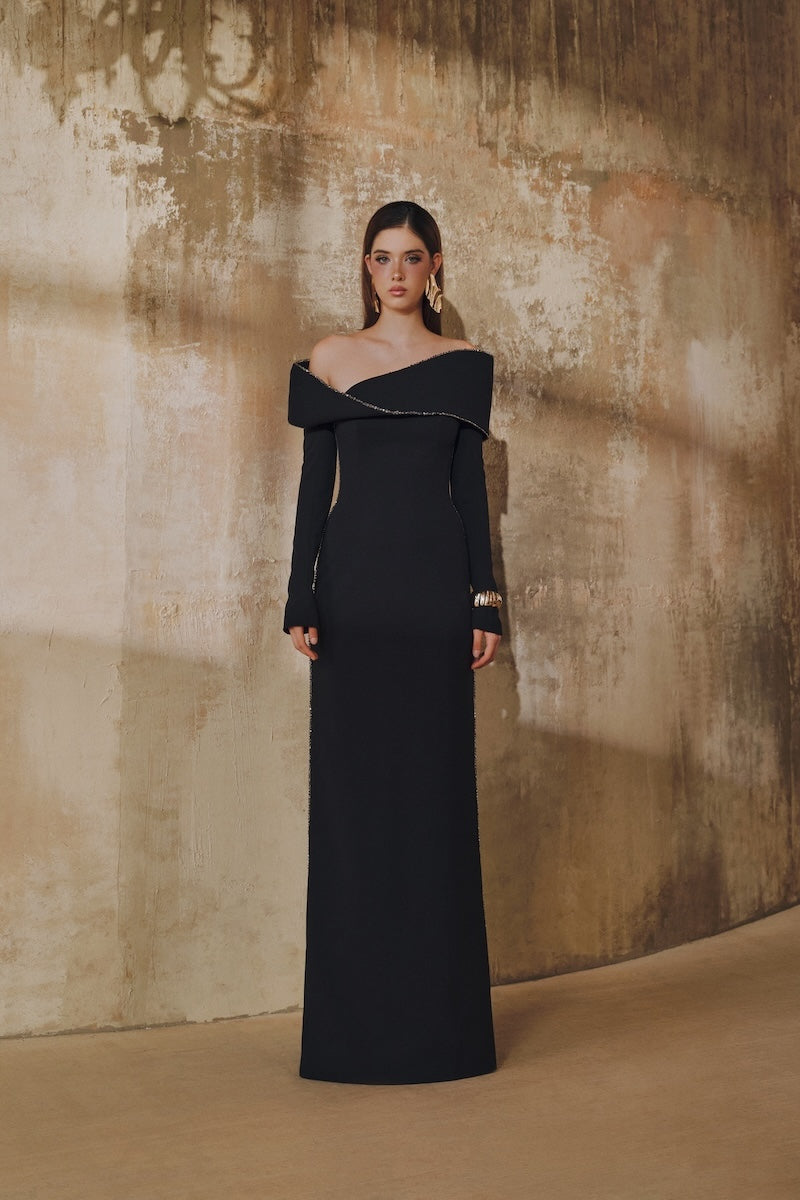 Black L'SCARLETT straight-cut off-shoulder long-sleeve 3D Mobius bust maxi dress, shown on a model.