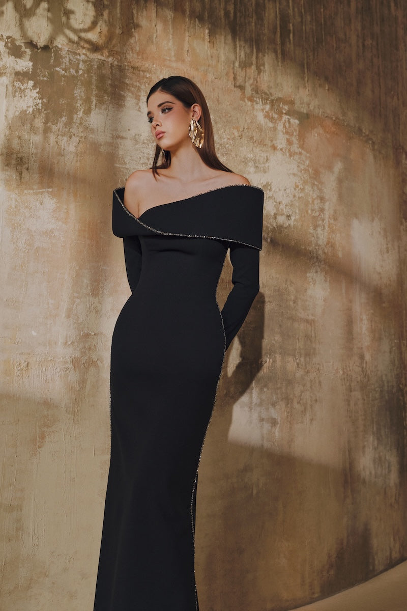 Black L'SCARLETT straight-cut off-shoulder long-sleeve maxi dress with 3D Mobius bust design, flowing fabric and elegant silhouette.