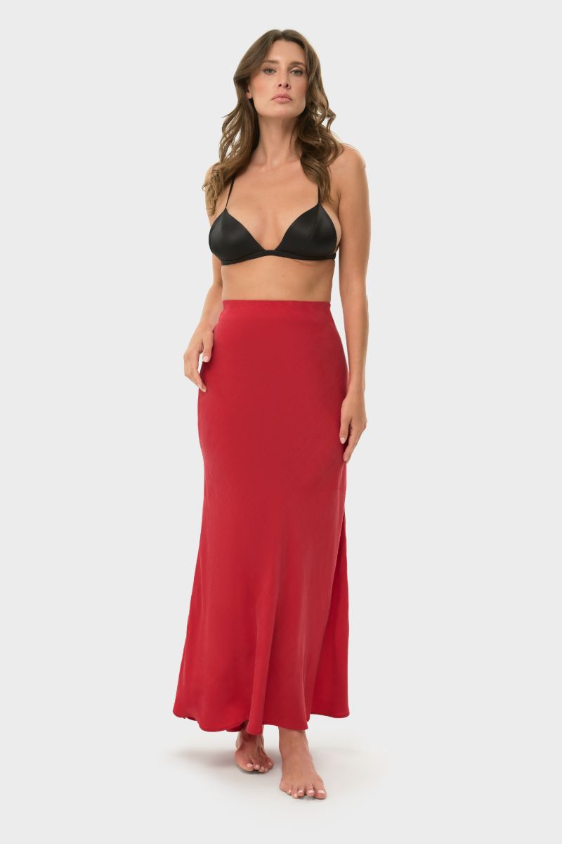 NiLuu Lucy slip skirt in rouge, a stylish maxi skirt with a flowy silhouette and vibrant red color, perfect for elegant looks.