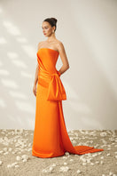 Le Thanh Hoa Clementine Flow gown with flowing fabric and elegant design, perfect for formal occasions.