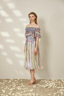 Multicolor floral midi dress by Le Thanh Hoa featuring vibrant floral patterns and a flowing silhouette.