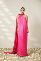 Luminous halter gown by Le Thanh Hoa featuring elegant fabric and a stylish halter neckline, perfect for formal events.
