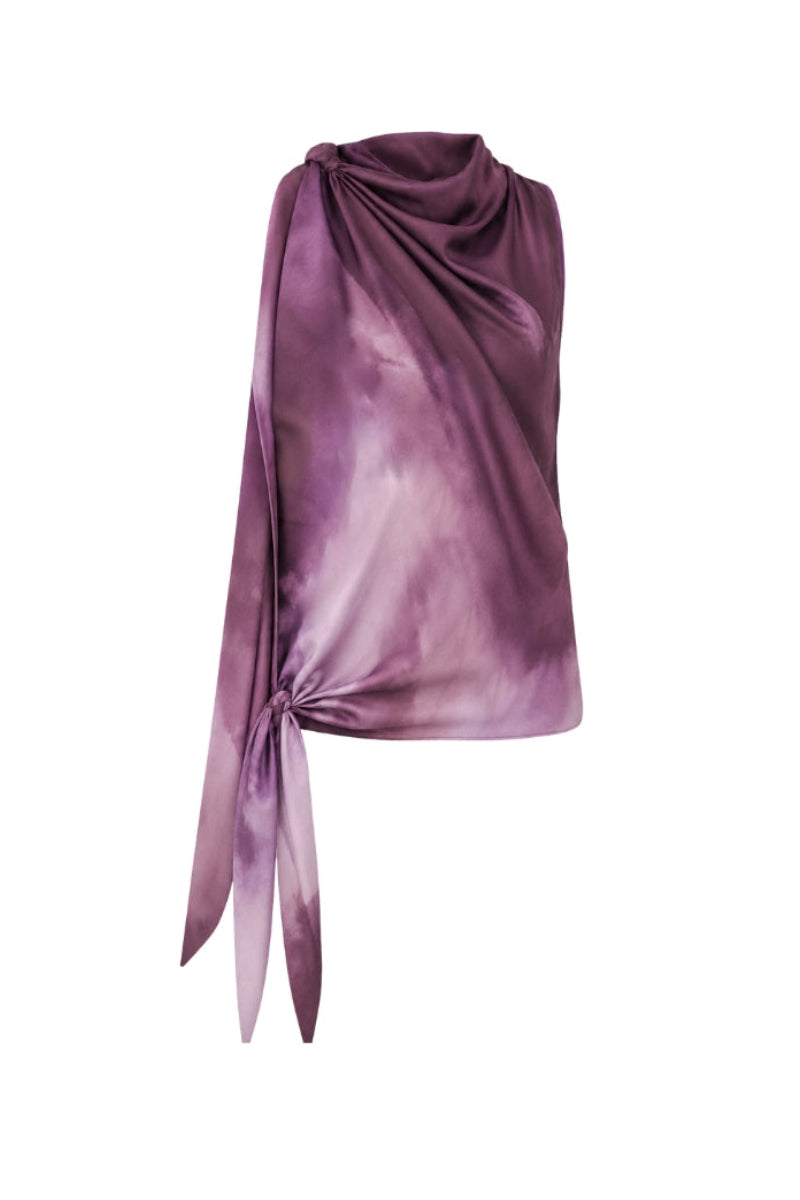 Tinta Latina Lumara blouse in purple print, lightweight top with floral design, short sleeves, and relaxed fit.
